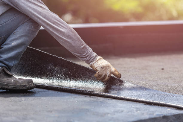 Professional Basement Waterproofing technician working in Clara City, MN